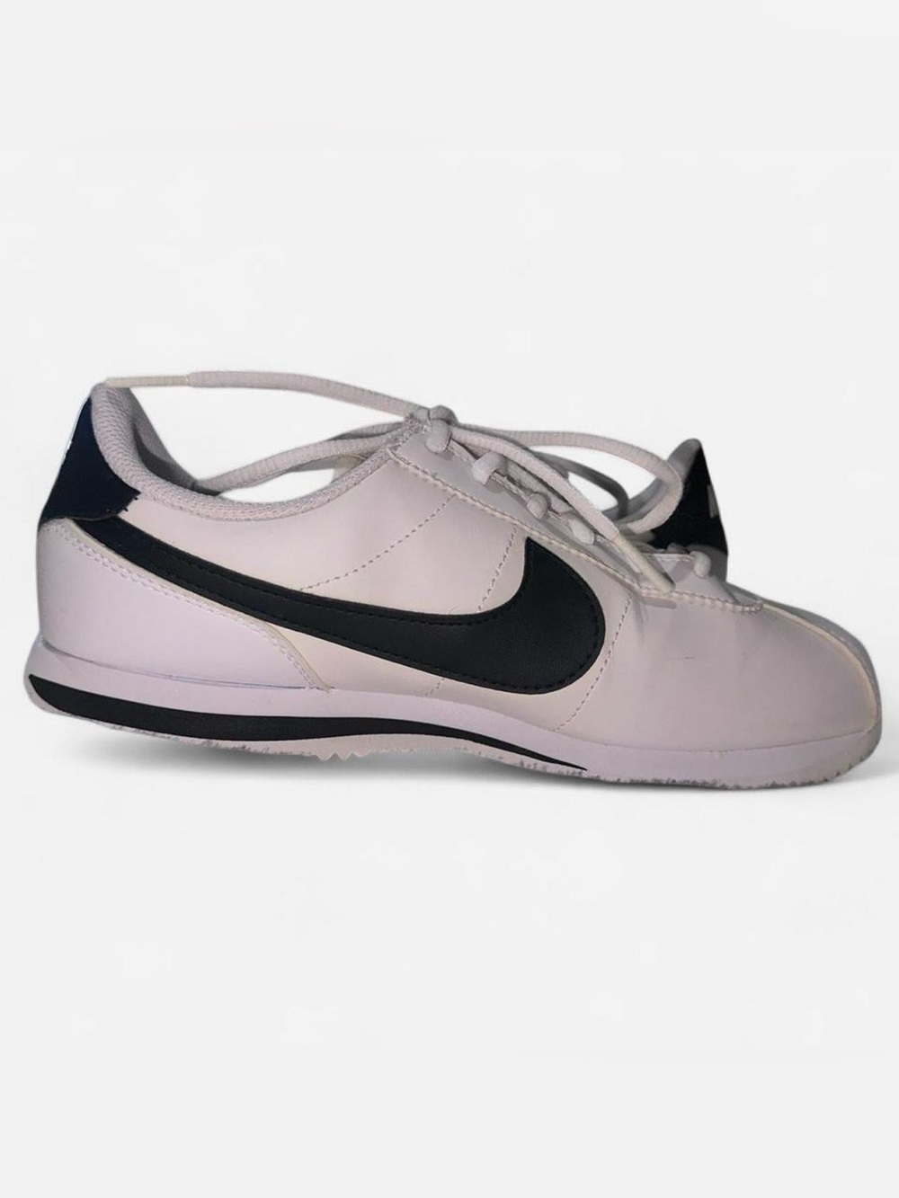 Nike Kid’s White and Black Low-Profile Athletic Sneaker